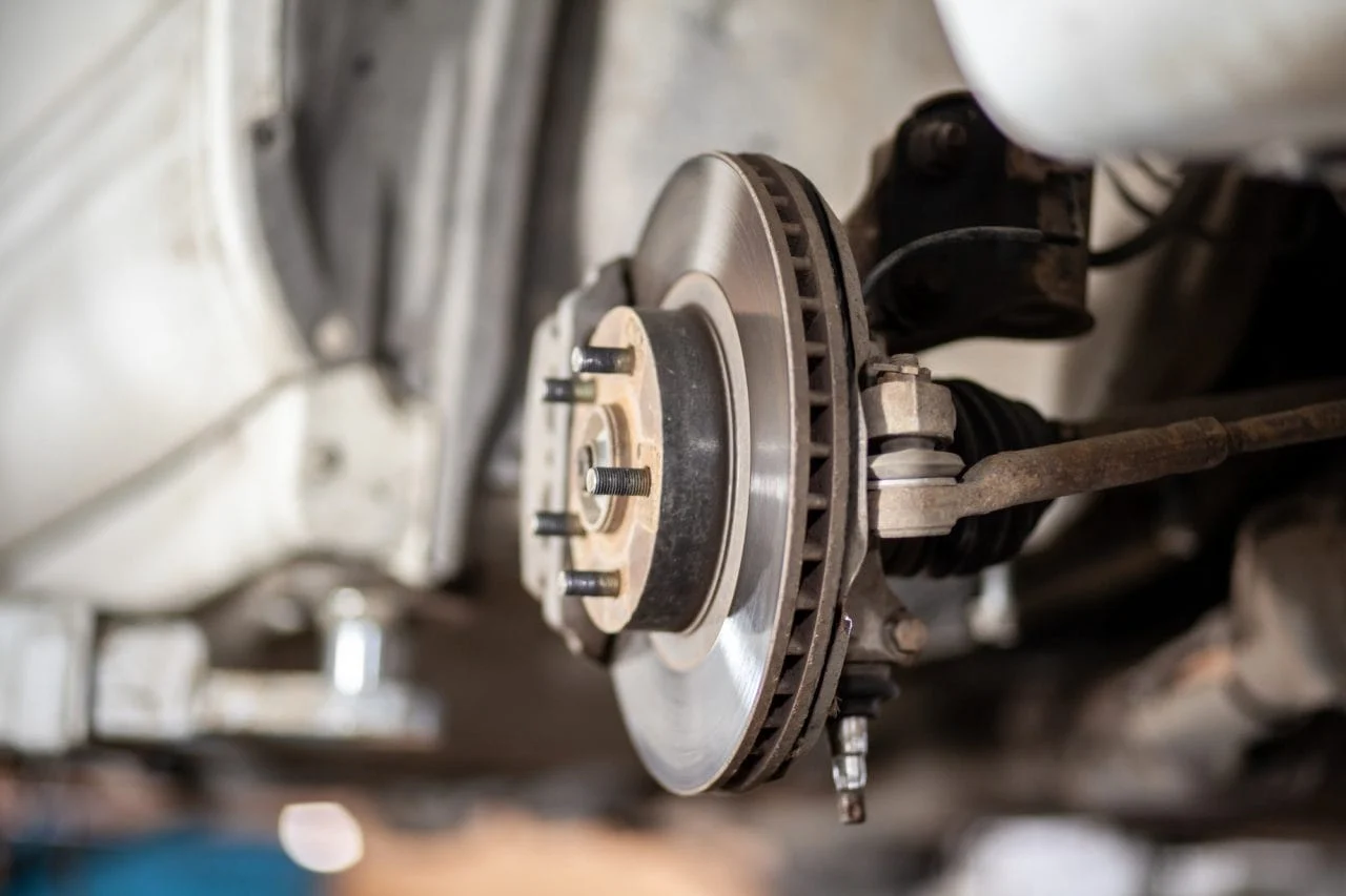 tire removed for wheel and visible brake inspection